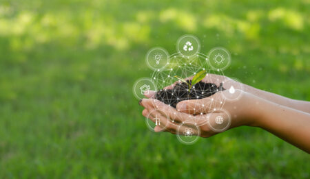 ESG icon concept circulating in hands for environment, society and governance. Esg. in sustainable business on networked connections on green background - em360